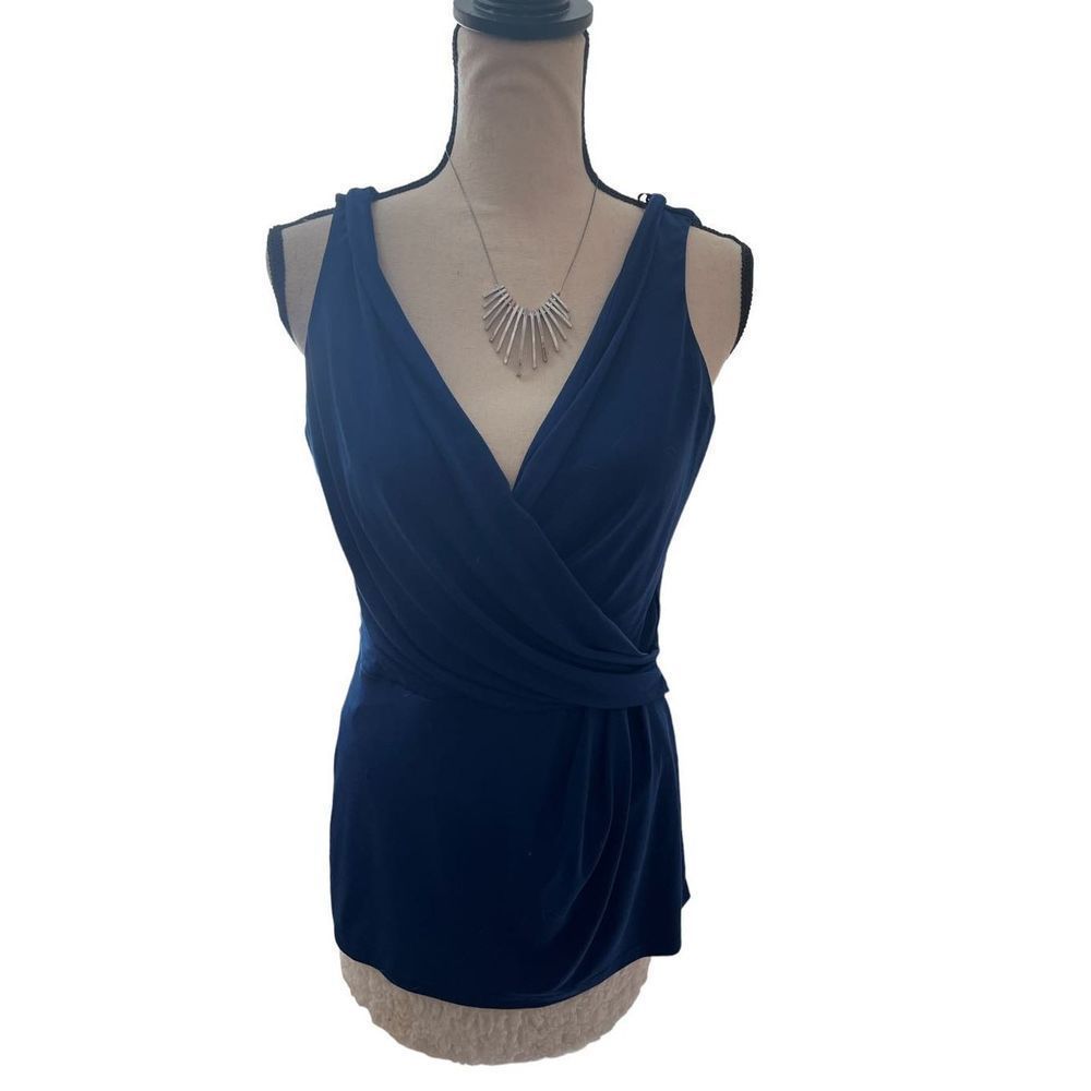 Large V Neck H & M deep V top, sleeveless, good condition, some wear